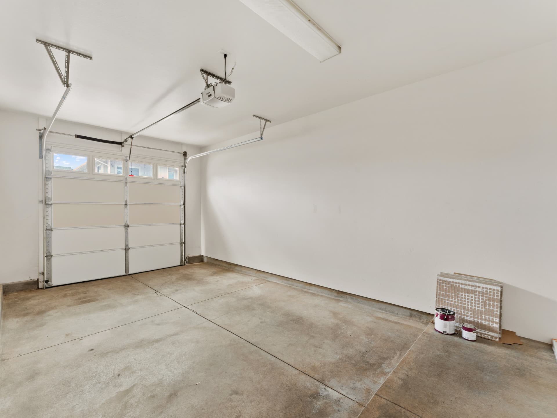 Attached one-car garage with automatic opener and storage space
